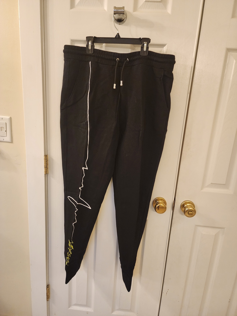 Versace Black Jogger Pants with White Line Graphic